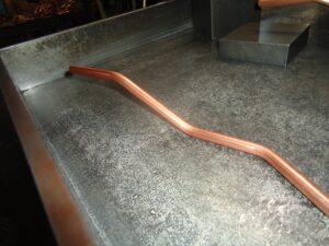 割れ発生や成形後の輸送時に変形が起こる銅管パイプ加工